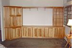 Natural Hickory Entertainment Center with Beaded Panel Doors